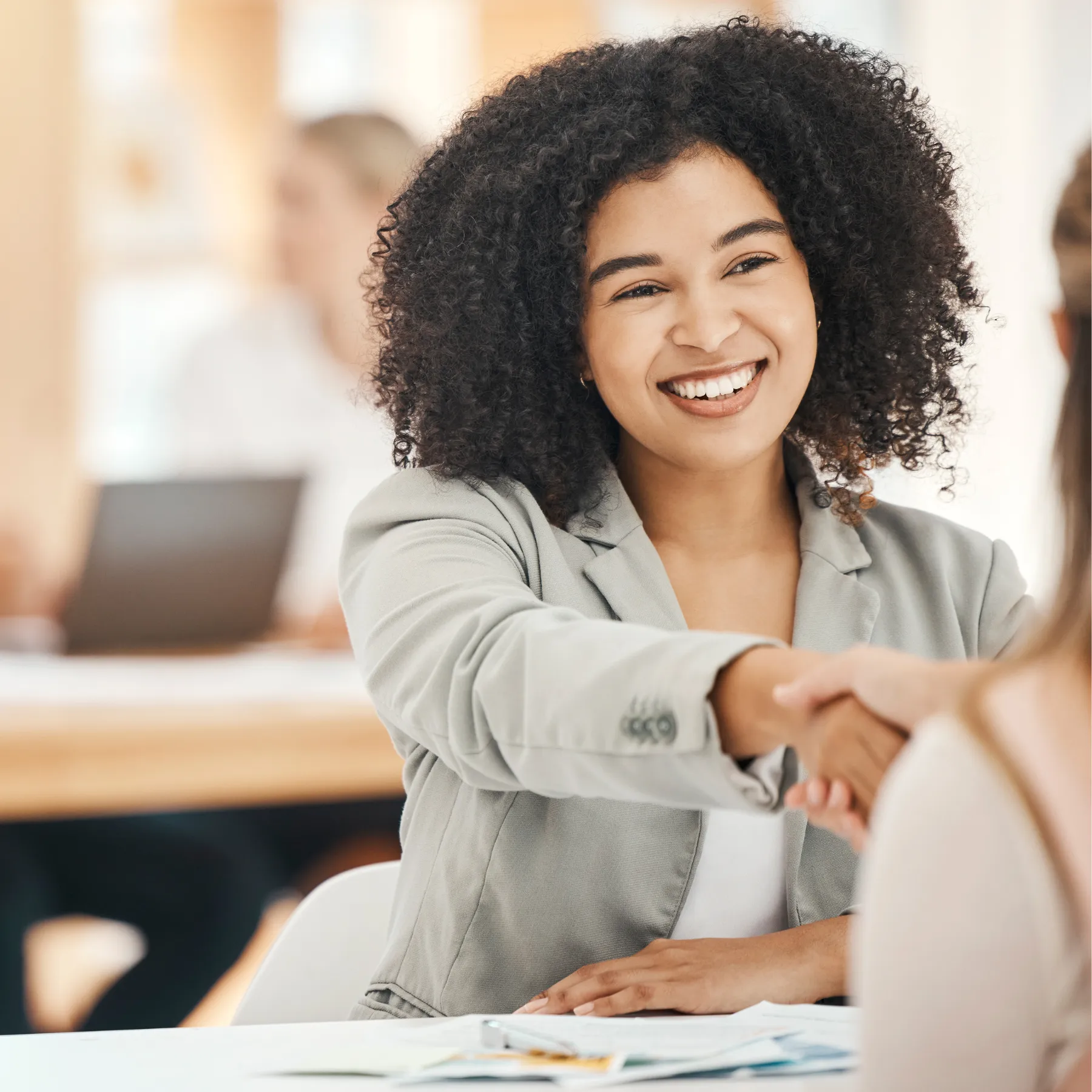 HR director welcoming a new hire at the start of their first day
